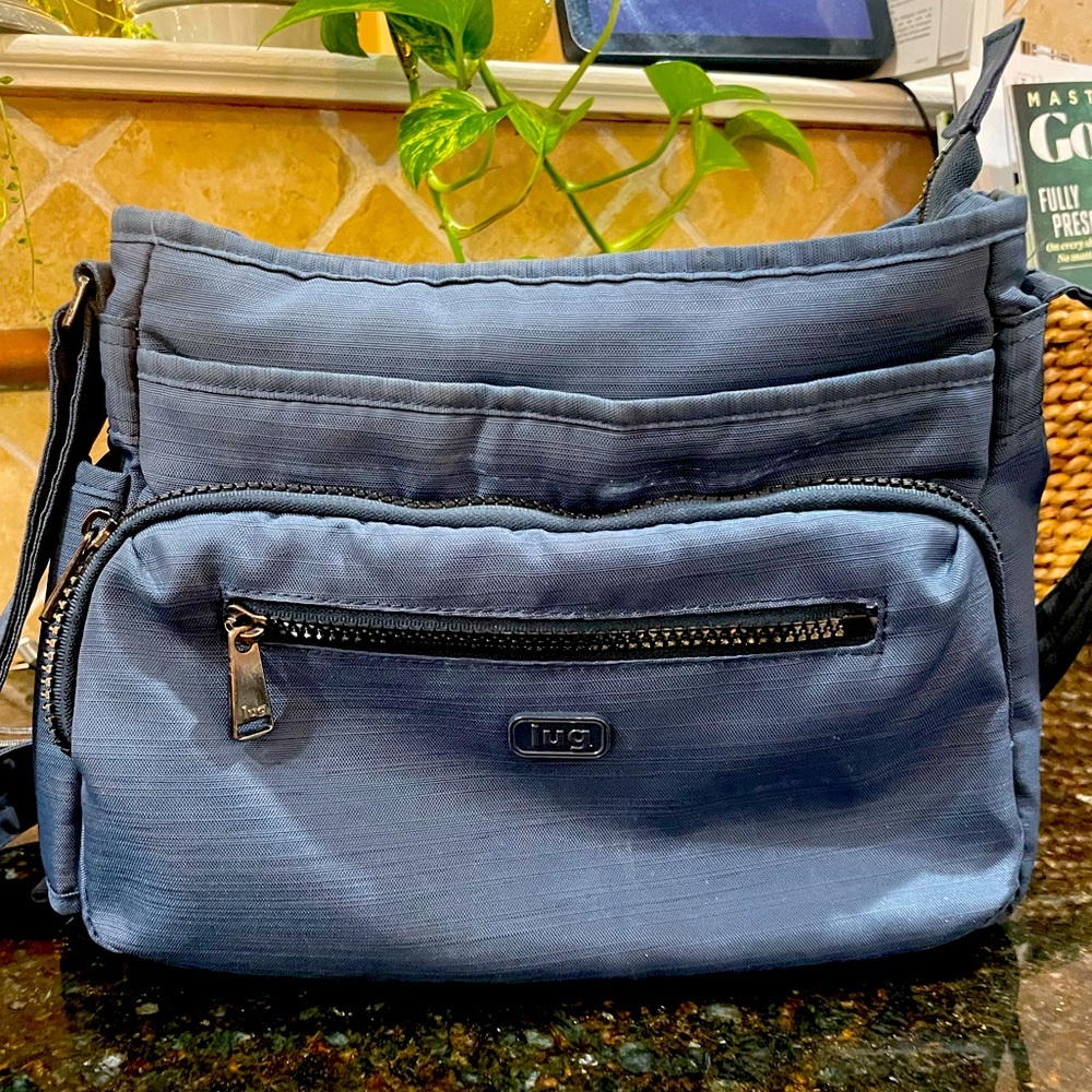 Lug travel handbag. Like new . Gorgeous blue crossbody .Travelers delight!